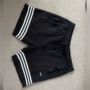 Adidas three strip athletic shorts.